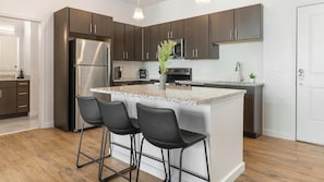 Fridge, dining tables - Landing | Modern 2BD, Clubhouse (Tarpon Springs)