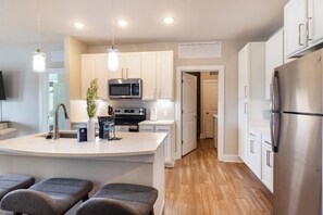 Fridge, dining tables - Landing | Modern 2BD in Clara Avenue (Panama City Beach)