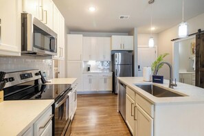 Fridge, dining tables - Landing | Modern 2BD in Clara Avenue (Panama City Beach)