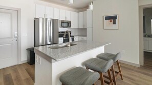Fridge, dining tables - Landing | Stylish 1BD, Game Room, Gym (Katy)