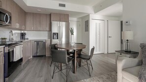 Fridge, dining tables - Landing | Chic 2BD, Gym (Hialeah)