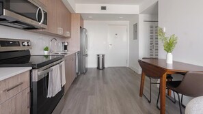 Fridge, dining table - Landing | Beautiful 1BD, Gym (Hialeah)