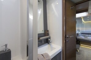 Hair dryer, towels, soap, toilet paper