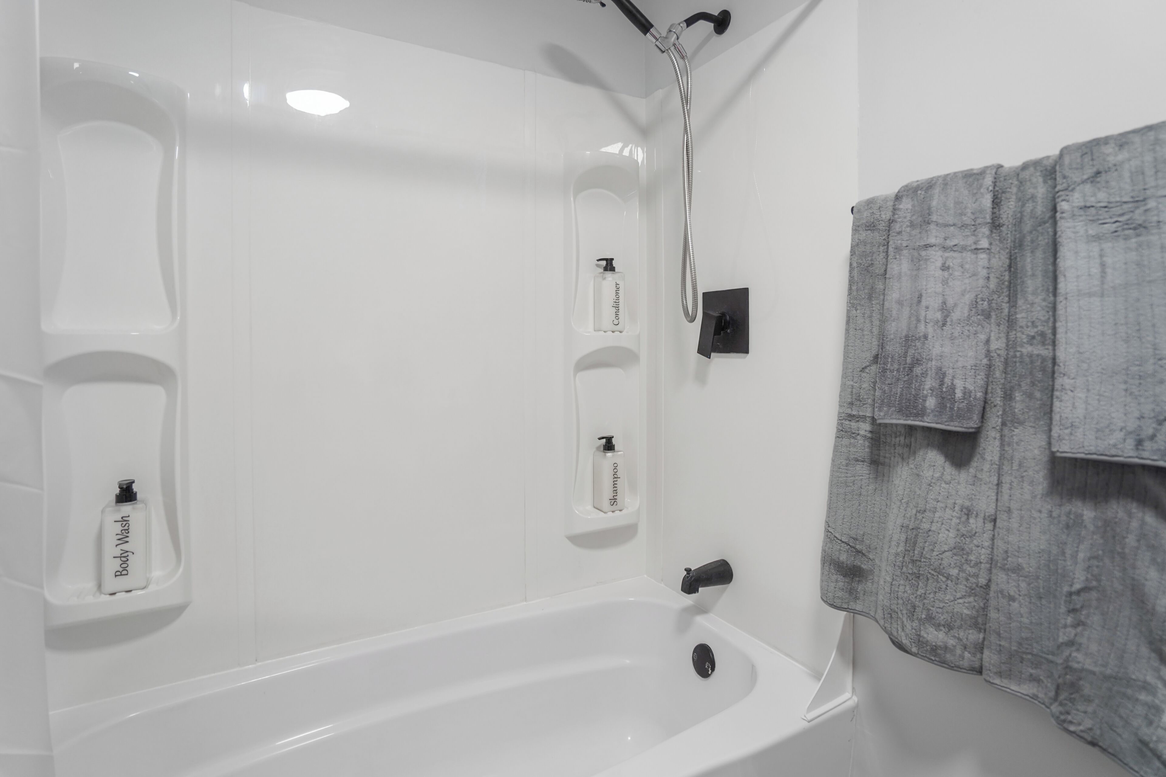 Hair dryer, towels, soap, toilet paper