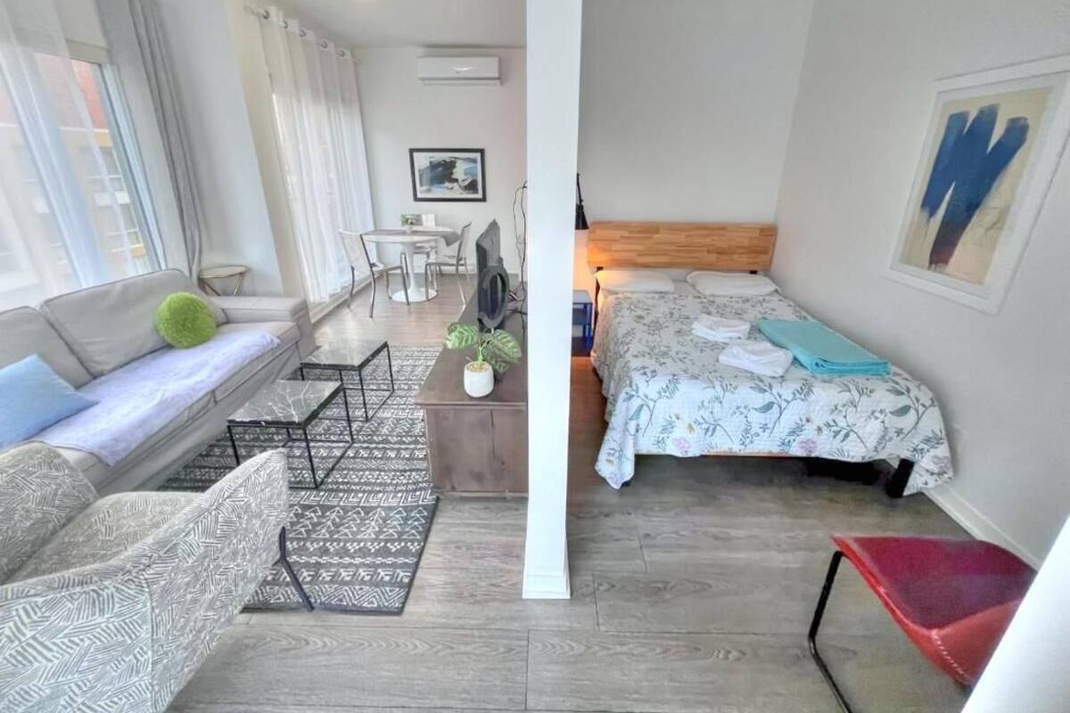 Quarto quádruplo luxo, vista para a cidade | Escrivaninha, cortinas blackout, ferros/tábuas de passar roupa