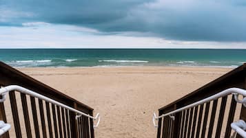 On the beach, sun loungers