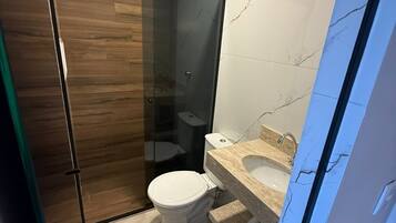 Shower, free toiletries, hair dryer, towels