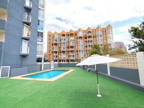 A residential building with a swimming pool and a green lawn. - Hernando I by Interhome (Calpe/Calp)