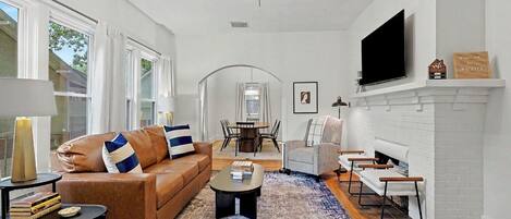 Smart TV, fireplace, books