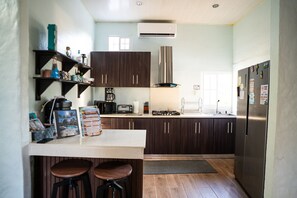 Private kitchen - Luxury Pool Villa • Private Beach Access • ATAMI (Tamanique)