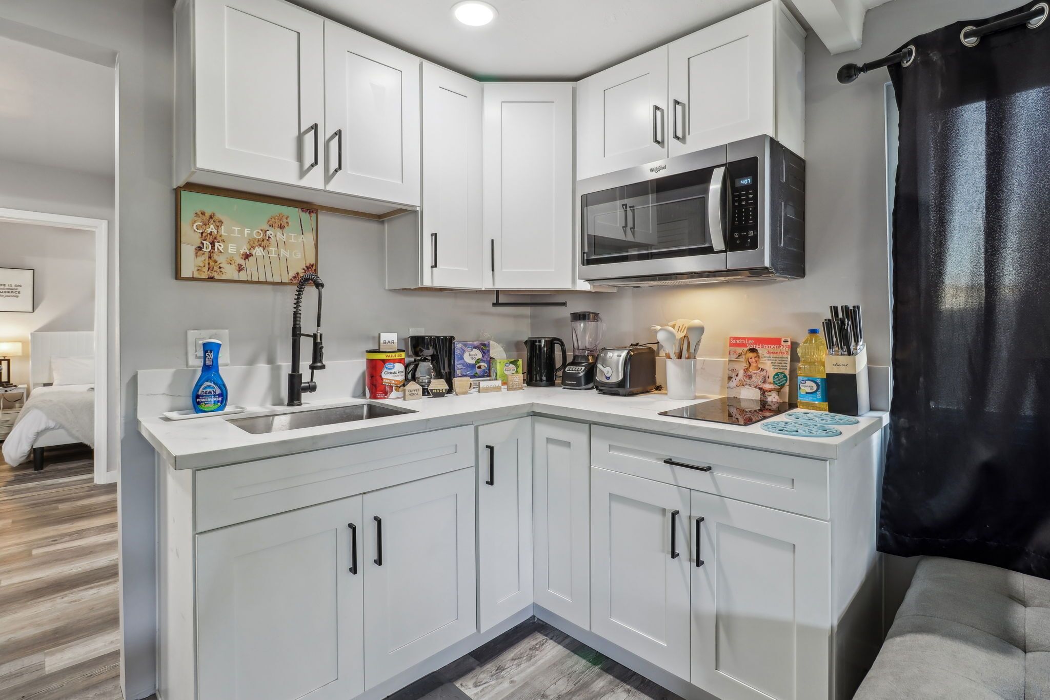 Fridge, microwave, stovetop, coffee/tea maker