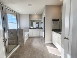 Shower, hair dryer, towels, soap - Comfortably Sleeps 14 - Spacious 4B 3Ba Home in a Prime Location (Wesley Chapel)