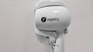 A white security camera mounted on a wall. - Crystal Palace Resort - Family Suite King (Port Bolivar)