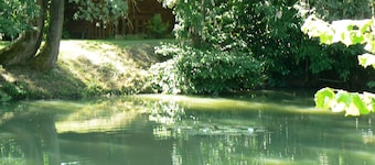 The house, as seen from the property's private pond