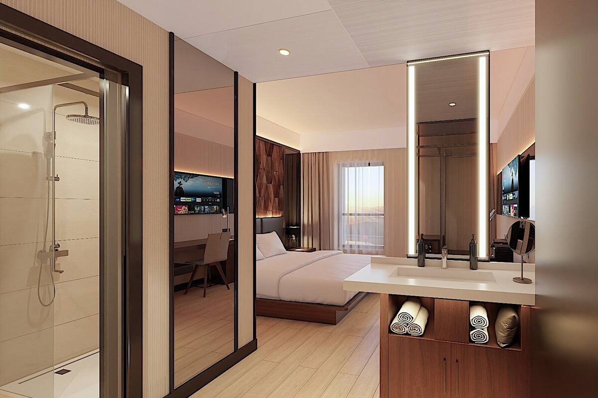 Premium bedding, in-room safe, laptop workspace, soundproofing