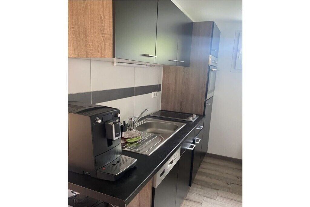 Fridge, oven, stovetop, dining tables