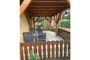Outdoor dining - "House by the harbor" A4 (Zislow)