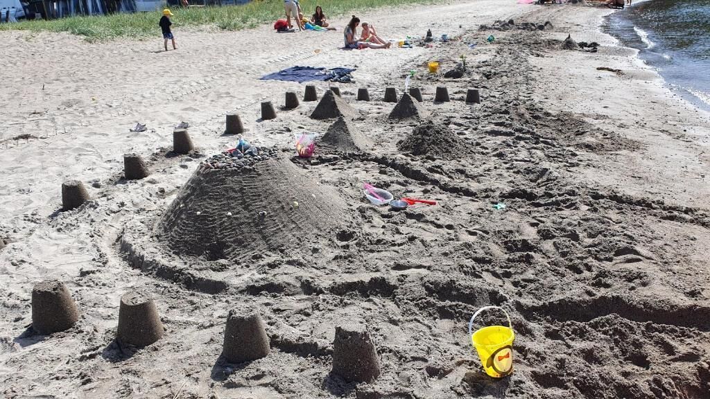 Familieleilighet, balkong, utsikt mot innsjø | Strand | På stranden
