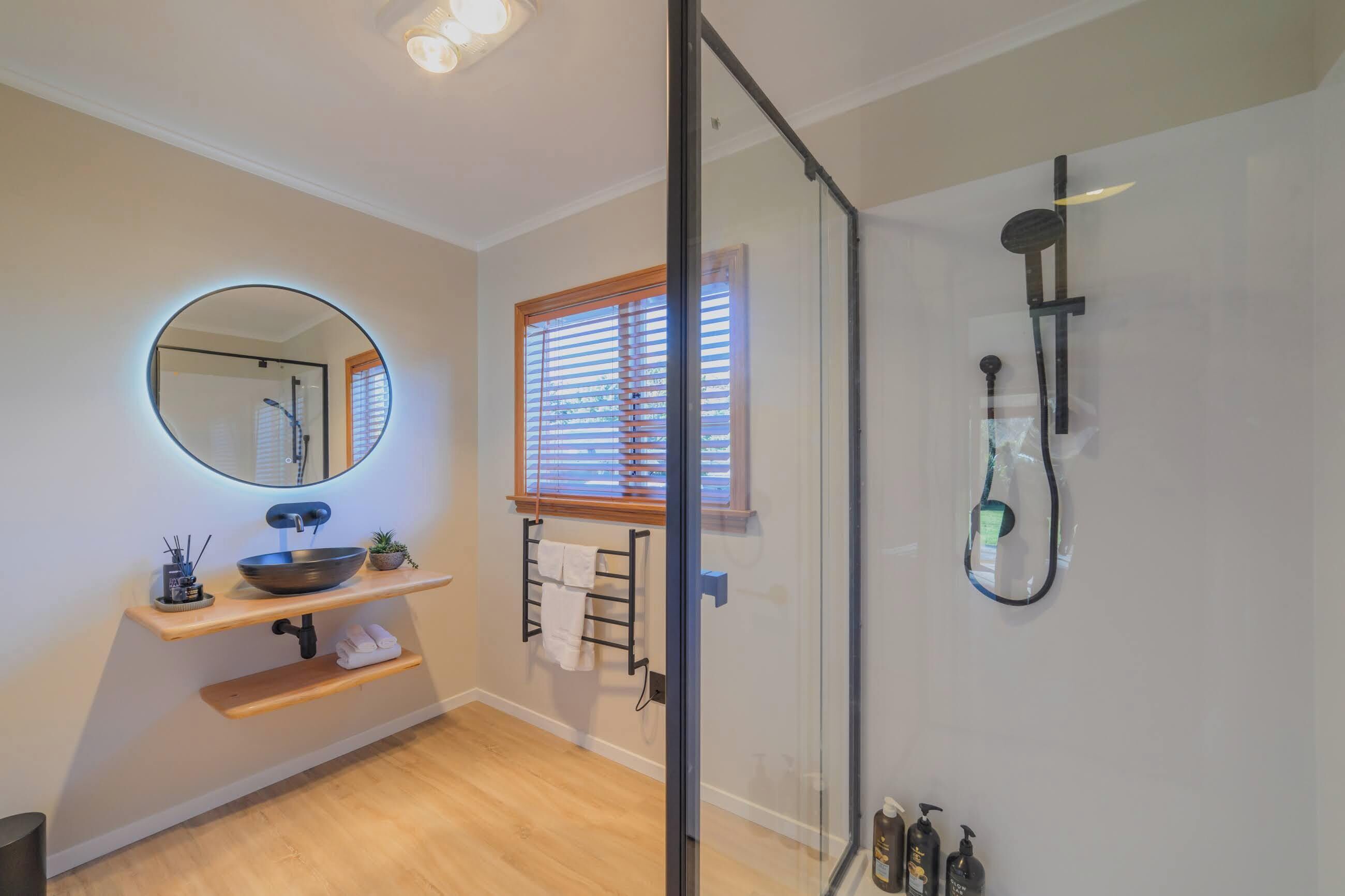 Shower, hair dryer, towels, shampoo