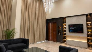 Chambre Deluxe double, balcon, vue sur le jardin | Intérieur