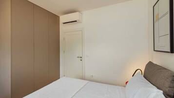 1 dormitorio, tabla de planchar con plancha, cuna de viaje y wifi gratis