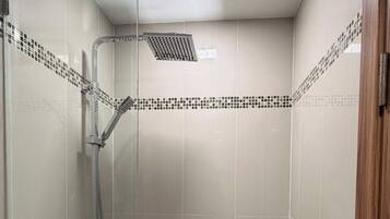 Hair dryer, towels, soap, shampoo