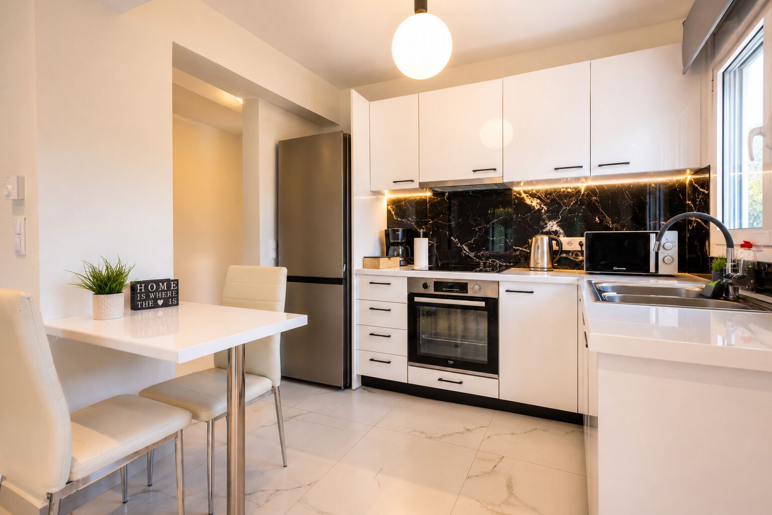 Full-size fridge, oven, cookware/dishes/utensils