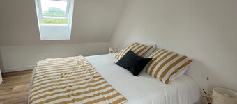 Charming, renovated home within walking distance of the beach—ocean view
