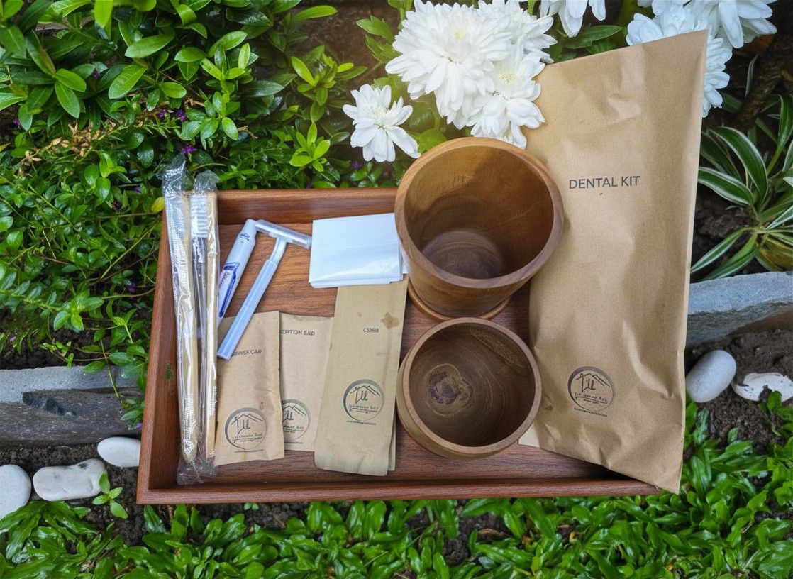 A tray with a dental kit, including a toothbrush, toothpaste, and a wooden cup, set against a backdrop of greenery and white flowers.
