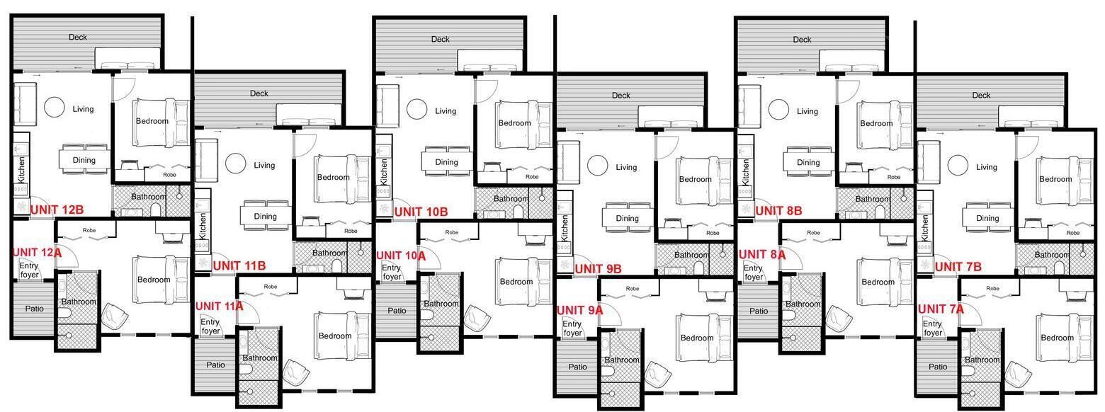 A hotel floor plan with multiple units, each containing a bedroom, bathroom, dining area, and entry foyer.