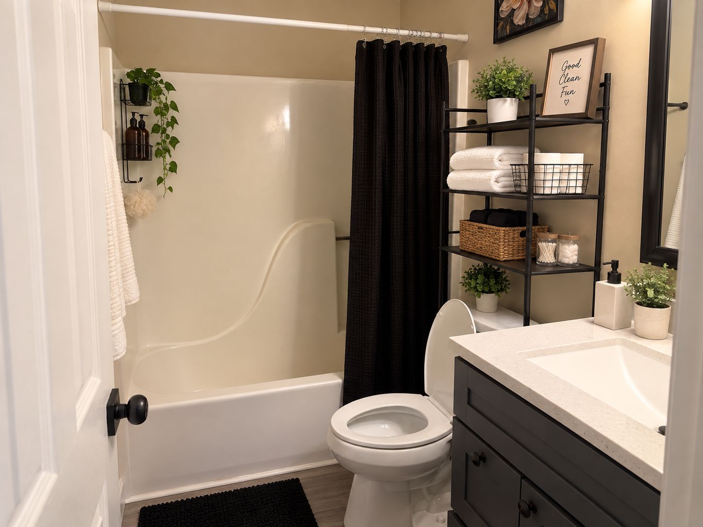 A modern bathroom with a bathtub, toilet, and a vanity with a mirror.