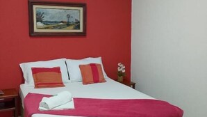 Suíte standard | Wi-Fi de cortesia, roupa de cama