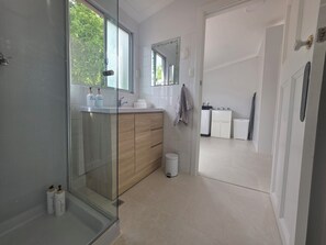 Shower, hair dryer, towels, soap