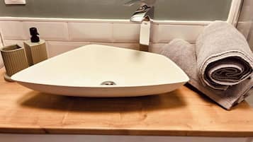 Hair dryer, towels, soap, toilet paper