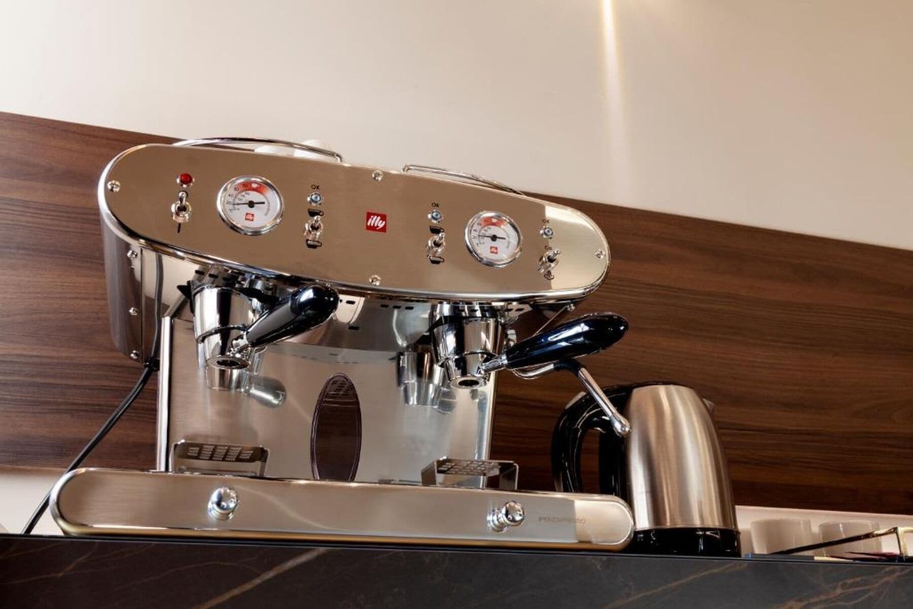 A coffee machine with multiple brewing options and a digital display.