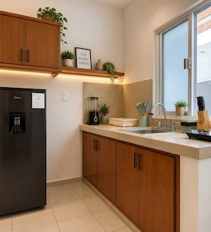 Toaster, blender, coffee grinder, paper towels