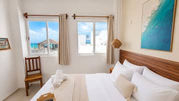 Habitació doble Deluxe, vistes al mar | Wifi gratuïta i roba de llit