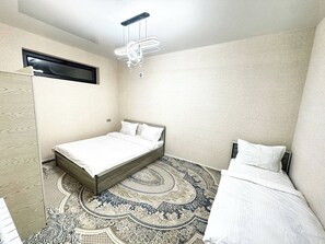 Room - Cozy 1-bedroom hotel in excellent Tashkent with AC (Tashkent)