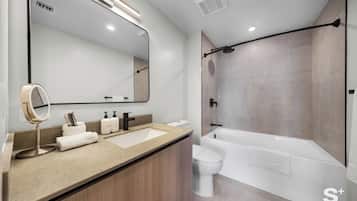 Condo, Balcony, City View | Bathroom | Free toiletries, hair dryer, towels, soap