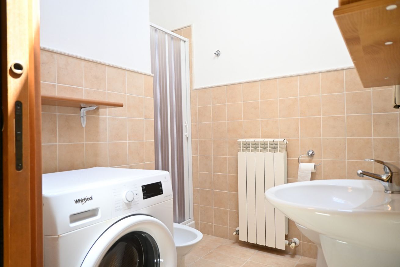 Ducha, bidé y toallas