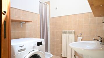 Ducha, bidé y toallas