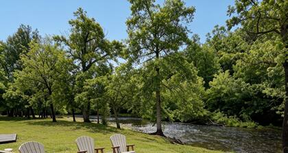 Unplug. Unwind. Steps to river.