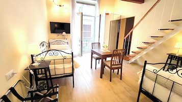 Deluxe Quadruple Room, Balcony, City View | In-room safe, iron/ironing board, free WiFi