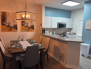Dining - Family-Friendly 3BR Townhome Minutes to Disney in Lake Berkley Resort -Pool &Gym (Kissimmee)