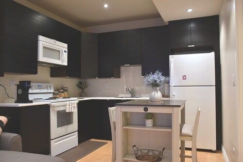 Private 2BR Suite | Kitchen & Laundry
