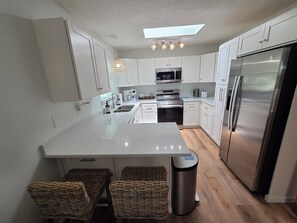Private kitchen - Make Beach Memories - Luxury AMI 2BR Beach House (Holmes Beach)