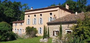 A large, two-story building with multiple windows and a stone facade. - Private Estate for 18 guests • Pool • Provence • No neighbours (Signes)