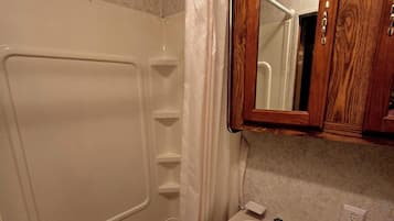 Shower, towels, toilet paper