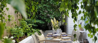 Maison de ville conçue par un architecte avec terrasse sur le toit à Oslo