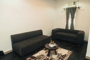 Deluxe Suite | Living area - Muster Point Hotel & Suites  (Port Harcourt)